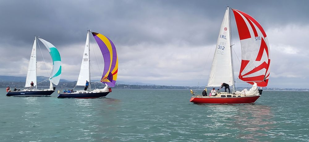 Shipman boats under spinnaker